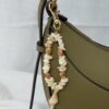 Porte clé/ Bijou de sac en chips de nacre et coquillages